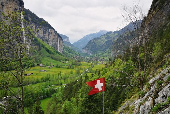 Best of Bernese Oberlands from Luzern - Interlaken drive-by: Victorian hotels, paragliders, and a souvenir beat