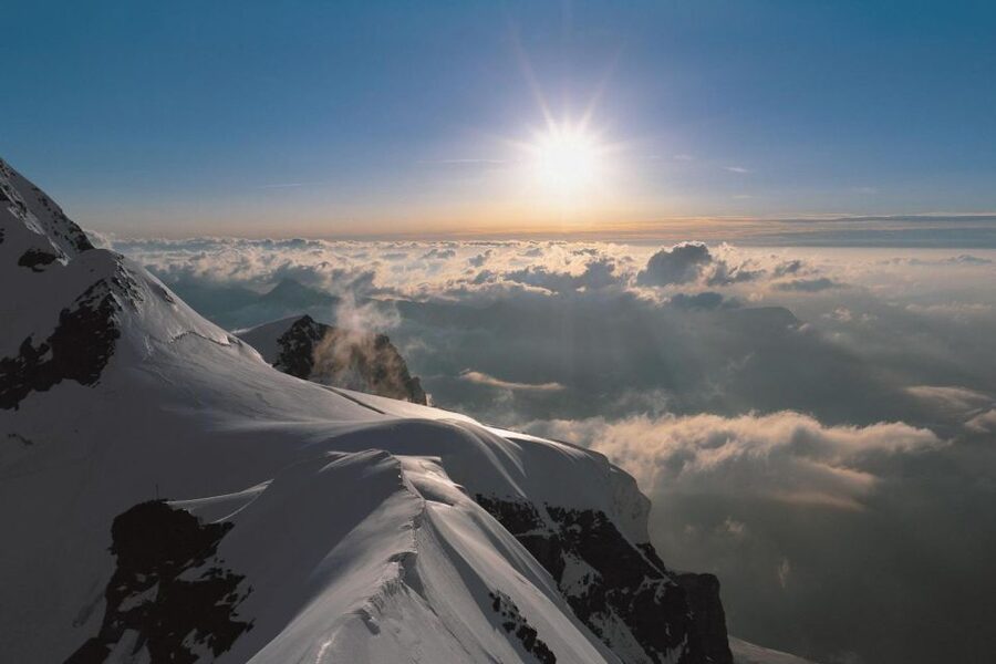 From Zurich: Jungfraujoch Guided Day Tour with Cogway Train - Downhill: Eigergletscher, Eiger Express cable car, then Grindelwald