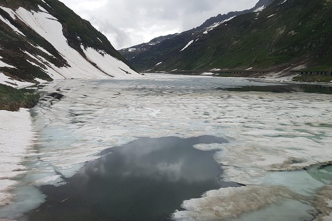 Glacier Express Panoramic Train Round Trip from Zürich With Private Guide - The Furka Base Tunnel and Goms Valley: Where Engineering Meets Mountain Drama