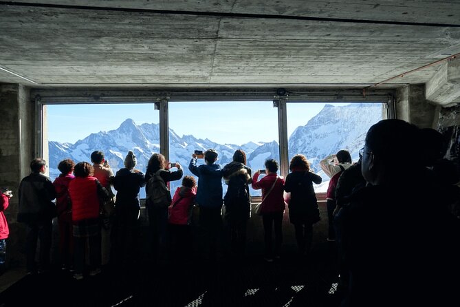 Jungfraujoch Private Tour – Top of Europe & Lauterbrunnen Valley - Ice Palace: tunnels of blue light and ice sculptures