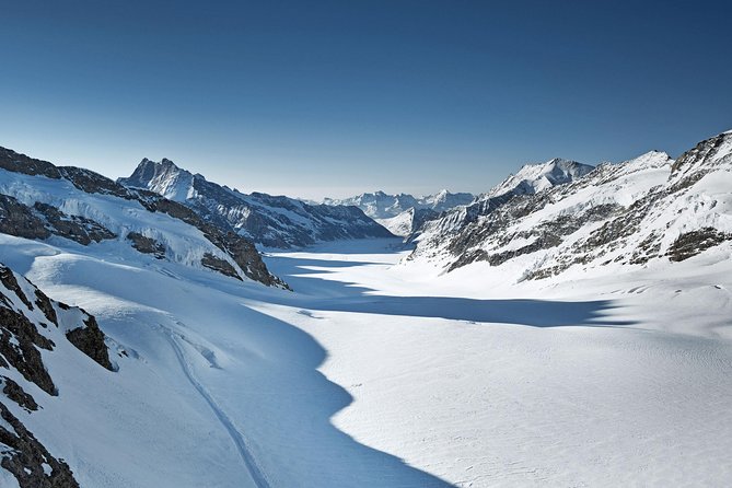 Jungfraujoch: Top of Europe Day Trip from Zurich - Ice Palace: walking inside the glacier world