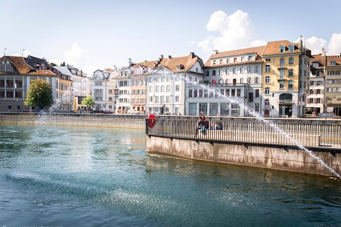 Lucerne Walking & Boat Tour: The Best Swiss Experience - Chaff Bridge and Key Lucerne Monument Stories