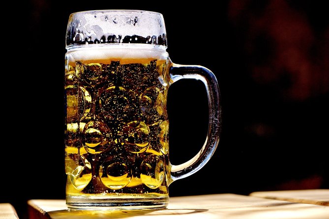 Lucerne Walking Tour and Beer Tasting - Chapel Bridge in 10 minutes: painted history and a famed covered span