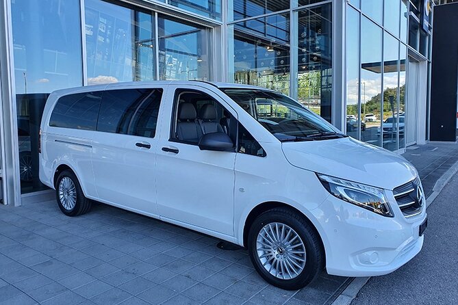 Private Arrival Transfer: from Zurich Airport to Zurich City - Meet-and-greet at Zurich Airport: name board, baggage claim, and fast recognition