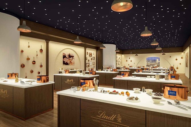 Private transfer To Lindt Home of Chocolate Museum From Zurich - Inside Lindt Home of Chocolate: the 9-meter fountain and the big visual wow