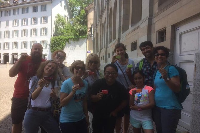 Swiss Chocolate Walking Tour of Zurich - Chocolate lineup: Sprüngli, Lindt, Max pralines, and Teuscher truffles
