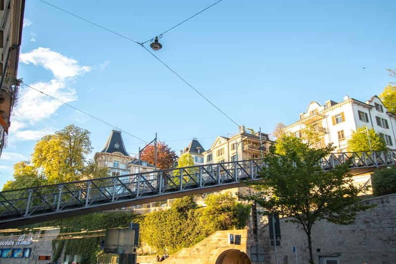 Zurich: 2-hour Best Intro Walking Tour with a Local - Grossmünster: iconic architecture, but explained in everyday terms