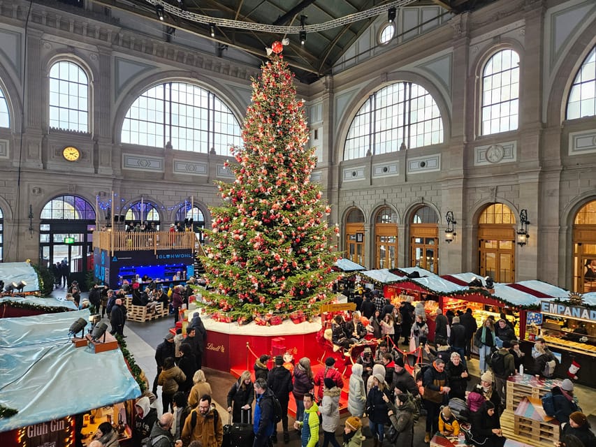 Zurich Christmas Market Tour - The indoor Christmas market at Zurich Main Station and its huge fir tree