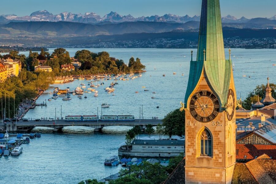 Zurich: City Bus Tour with Audio Guide and Lake Cruise - From bus to boat at Bürkliplatz: Lake Zurich without the stress
