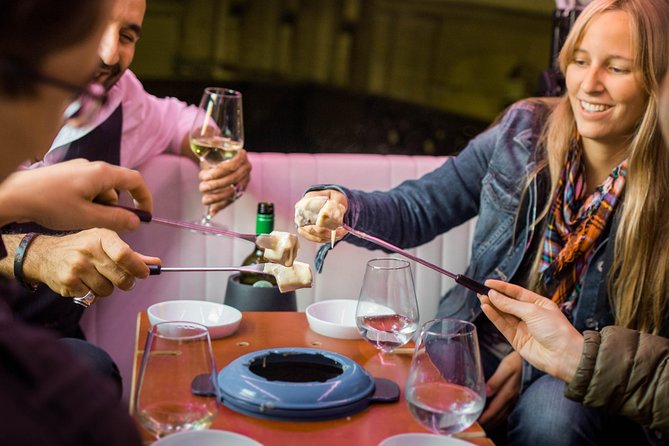 Zurich eTukTuk Private Tour - with Cheese Fondue and Wine - Your 90-minute route: Bahnhofstrasse to the riverfront loop