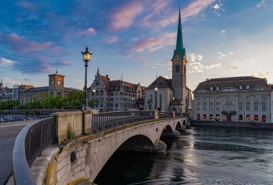 Zurich - Old Town Private Walking Tour - Rathaus and the Limmat: Big Buildings, River Context
