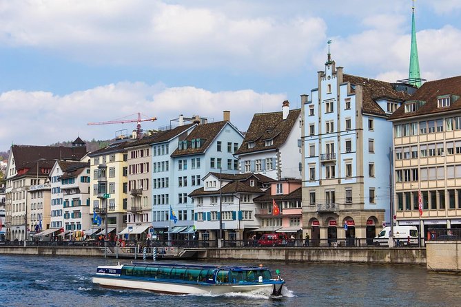Zurich Walking Tour With Cruise and Aerial Cable Car - Lake Zurich Ferry Cruise: Lindt Chocolate and Celebrity Shore Talk